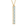 Providence vertical bar pendant featuring 6 petite Nantucket Blue Topaz baguette stones set in 14k yellow gold - angled view