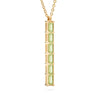 Providence vertical bar pendant featuring 6 petite Peridot baguette stones set in 14k yellow gold - angled view