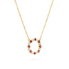 Rosecliff open circle necklace with 16 alternating 2 mm round cut garnets & diamonds prong set in 14k gold - angled view