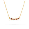 Rosecliff bar necklace with eleven alternating 2 mm round cut garnets and diamonds prong set in 14k gold - angled view