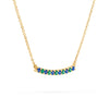 Rosecliff bar necklace with eleven alternating 2 mm faceted emeralds and sapphires prong set in 14k yellow gold - angled view