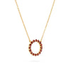 Rosecliff open circle necklace with sixteen 2 mm faceted round cut garnets prong set in 14k yellow gold - angled view