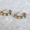 Rosecliff huggie earrings in gold featuring rubies, citrines, emeralds, sapphires and amethysts alternating with diamonds