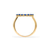 Rosecliff open circle ring featuring sixteen 2 mm faceted round cut sapphires prong set in 14k yellow gold - standing view