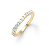 Rosecliff stackable ring featuring eleven 2 mm faceted round cut aquamarines prong set in 14k yellow gold - front view
