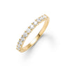 Rosecliff stackable ring in 14k yellow gold featuring eleven 2mm faceted round cut prong set white topaz - front view