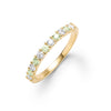 Rosecliff stackable ring featuring eleven alternating 2mm peridots and diamonds prong set in 14k yellow gold - front view