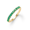 Rosecliff stackable ring featuring eleven 2 mm faceted round cut emeralds prong set in 14k yellow gold - front view