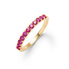 Rosecliff stackable ring featuring eleven 2 mm faceted round cut rubies prong set in 14k yellow gold - front view