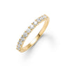 Rosecliff stackable ring featuring eleven 2 mm faceted round cut white topaz prong set in 14k yellow gold - front view