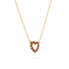 Rosecliff Heart Necklace featuring twelve faceted round cut garnets prong set in 14k yellow Gold - angled view