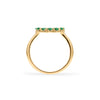 Rosecliff small open circle ring featuring twelve 2 mm faceted round cut emeralds prong set in 14k gold - standing view