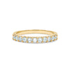 Rosecliff stackable ring featuring eleven 2 mm faceted round cut aquamarines prong set in 14k yellow gold