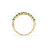 Rosecliff stackable ring featuring eleven 2 mm faceted round cut emeralds prong set in 14k yellow gold - standing view