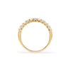 Rosecliff stackable ring featuring alternating 2mm Nantucket blue topaz and diamonds prong set in 14k gold - standing view