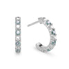 Two Rosecliff huggie earrings in 14k white gold each featuring nine alternating 2mm round cut alexandrites and diamonds