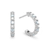 Two Rosecliff huggie earrings in 14k white gold each featuring nine alternating 2mm round cut aquamarines and diamonds