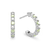 Two Rosecliff huggie earrings in 14k white gold each featuring nine alternating 2mm round cut prong set peridots and diamonds