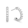 A pair of Rosecliff huggie earrings in 14k white gold each featuring nine 2mm faceted round cut prong set diamonds