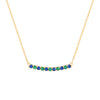 Rosecliff bar necklace with eleven alternating 2 mm round cut emeralds and sapphires prong set in solid 14k gold - front view