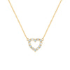 Rosecliff Heart Necklace featuring twelve alternating aquamarines and diamonds prong set in 14k yellow Gold - front view