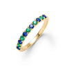 Rosecliff stackable ring featuring eleven alternating 2 mm sapphires and emeralds prong set in 14k gold - front view