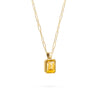 Adelaide paper clip chain and a Warren pendant with an emerald cut bezel set citrine gemstone in 14k gold - angled view