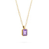 Adelaide paper clip chain and a Warren pendant with an emerald cut bezel set amethyst gemstone in 14k gold - angled view