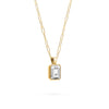 Adelaide paper clip chain and a Warren pendant with an emerald cut bezel set white topaz gemstone in 14k gold - angled view