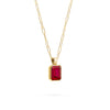 Adelaide paper clip chain and a Warren pendant with an emerald cut bezel set ruby gemstone in 14k gold - angled view