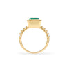 Warren ring in 14k yellow gold with accent diamonds featuring one 10 x 8 mm emerald cut bezel set emerald - standing view