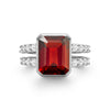 Warren ring in 14k white gold with accent diamonds featuring one 10 x 8 mm emerald cut bezel set garnet - front view