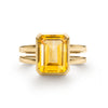 Warren ring in 14k yellow gold featuring one 10 x 8 mm emerald cut bezel set citrine - front view