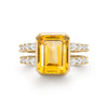 Warren ring in 14k yellow gold with accent diamonds featuring one 10 x 8 mm emerald cut bezel set citrine - front view