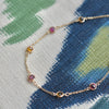 Sunset bracelet featuring alternating 4 mm Pink Tourmalines and Citrines bezel set in 14k yellow gold