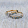 Pair of Rosecliff stackable rings featuring 2mm Nantucket blue topaz, one with alternating diamonds, prong set in 14k gold