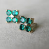 Pair of 14k yellow gold Greenwich 4 Birthstone earrings each featuring four 4 mm round cut emeralds and one 2.1 mm diamond
