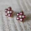 Pair of 14k gold Greenwich 5 Birthstone earrings each featuring five 4 mm faceted rubies and one 2.1 mm diamond