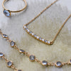 Ring and several necklaces including a gold Rosecliff bar necklace with eleven alternating 2 mm aquamarines and diamonds