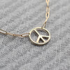 Adelaide Mini necklace featuring one 1/2” cutout Peace Sign in 14k yellow gold